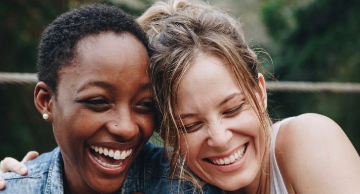 adult friends laughing and talking together